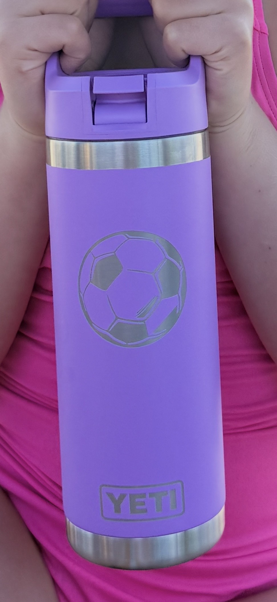 Yeti water bottle, purple with “Jane Charleton” and a soccer ball engraved.   